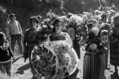 People from the community walk towards the Tuilelen's cemetery to bury Rivaldo Jimenez Ramirez, Santa Cristina Garcia, and Ivan Gudiel Pablo in Comitancillo, Guatemala, on March 14, 2021.
On January 22, 2021, nineteen charred bodies were found on a country road in Tamaulipas, Mexico's northeastern state bordering the United States. Sixteen of the victims were Guatemalan, thirteen from the same village, Comitancillo, and the others were of Mexican descent. The bodies were inside a pickup truck, hit by 113 bullets, and burned.
The massacre, according to investigators, would be linked to a dispute between criminal groups to control the migrant routes. Twelve police officers are under trial for allegedly having committed the crime.
The photographer traveled to Comitancillo to visit the families of the victims, and document the funerals.
Thousands of people, consumed by grief, buried relatives and friends as if burying the hope that a better future was possible.
The community welcomed journalists and photographers in their homes and during the three-day funeral processions hoping that, by the world knowing their suffering, such an event would not occur again. People from the community walk towards the Tuilelen's cemetery to bury Rivaldo Jimenez Ramirez, Santa Cristina Garcia, and Ivan Gudiel Pablo in Comitancillo, Guatemala, on March 14, 2021.
On January 22, 2021, nineteen charred bodies were found on a country road in Tamaulipas, Mexico's northeastern state bordering the United States. Sixteen of the victims were Guatemalan, thirteen from the same village, Comitancillo, and the others were of Mexican descent. The bodies were inside a pickup truck, hit by 113 bullets, and burned.
The massacre, according to investigators, would be linked to a dispute between criminal groups to control the migrant routes. Twelve police officers are under trial for allegedly having committed the crime.
The photographer traveled to Comitancillo to visit the families of the victims, and document the funerals.
Thousands of people, consumed by grief, buried relatives and friends as if burying the hope that a better future was possible.
The community welcomed journalists and photographers in their homes and during the three-day funeral processions hoping that, by the world knowing their suffering, such an event would not occur again.