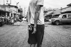 Police arrest a Venezuelan boy accused of theft in Maicao, La Guajira, Colombia, on August 15, 2018.
The poverty and the precarious living conditions in the migrants' settlements and the border towns' streets push some into criminal survival strategies. Because of the pandemic, a greater social instability has hit Colombia, and xenophobia has risen. Colombian citizens are concerned about migrants gathering in the streets, informal camps, and migration routes because that could spread the virus.
The photographer's attention was caught by the scene of this young boy detained while working close to the city market. Police arrest a Venezuelan boy accused of theft in Maicao, La Guajira, Colombia, on August 15, 2018.
The poverty and the precarious living conditions in the migrants' settlements and the border towns' streets push some into criminal survival strategies. Because of the pandemic, a greater social instability has hit Colombia, and xenophobia has risen. Colombian citizens are concerned about migrants gathering in the streets, informal camps, and migration routes because that could spread the virus.
The photographer's attention was caught by the scene of this young boy detained while working close to the city market.