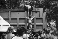 A group of migrants climbs the wall of a coal truck whose driver offered them a ride in Pamplona, in North Santander, Colombia, on October 10, 2018.
Along the Andean route connecting the Cucuta border city to Bucaramanga and the capital city Bogotà, temperatures are challenging for Venezuelan migrants, used to the much wormer Caribbean climate. The journey on foot can last weeks, and international aid is scant, far from the media's eyes, focused on the main border cities. At night, people find refuge in warehouses offered by Colombian citizens.
The people in the photograph had found refuge in an abandoned house that an American NGO was rebuilding as a charity shelter. The photographer was interviewing and photographing these families when a nearby woman told a truck driver had agreed to transport them to Bucaramanga. A religious fanatic, the woman insisted that they prayed before leaving, yelling at them that their condition depended on their sins and their faith in Venezuelan socialism.
The photographer worked with the people’s consent. A group of migrants climbs the wall of a coal truck whose driver offered them a ride in Pamplona, in North Santander, Colombia, on October 10, 2018.
Along the Andean route connecting the Cucuta border city to Bucaramanga and the capital city Bogotà, temperatures are challenging for Venezuelan migrants, used to the much wormer Caribbean climate. The journey on foot can last weeks, and international aid is scant, far from the media's eyes, focused on the main border cities. At night, people find refuge in warehouses offered by Colombian citizens.
The people in the photograph had found refuge in an abandoned house that an American NGO was rebuilding as a charity shelter. The photographer was interviewing and photographing these families when a nearby woman told a truck driver had agreed to transport them to Bucaramanga. A religious fanatic, the woman insisted that they prayed before leaving, yelling at them that their condition depended on their sins and their faith in Venezuelan socialism.
The photographer worked with the people’s consent.