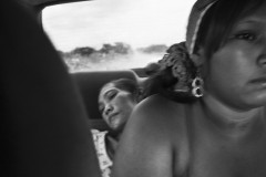 Maricela Uriana Epiayu; 22; was a mother of two children under the age of 5. Doctors said she had severe malnutrition and diabetes and had gone blind. With the help of a Bogota-based nongovernmental organization; Epiayu was taken to the hospital and received support at home with her children until her death from an infection in August 2016. In the pho- tograph; Maricela lays in the back seat of a car directed to the hospital of Riohacha.