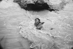 A girl is playing in a rain-made stream. After more than 4 years of drought, in May 2016 it rained a few times in the Southern part of the peninsula.