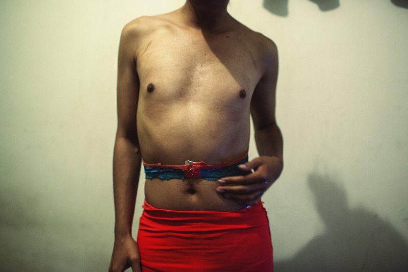 Tania, 24, is preparing herself for a new night of work in the barrio Santa Fe’, Bogota’.